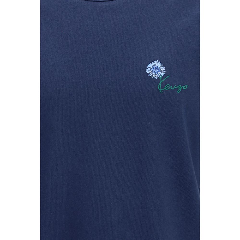 T-shirt en coton bleu de la marque Kenzo, coupe décontractée avec logo Kenzo visible sur la poitrine.
