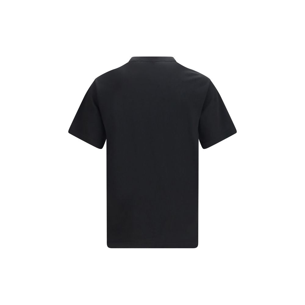 T-shirt en coton noir de la marque Kenzo, style décontracté avec logo Kenzo visible sur le devant.