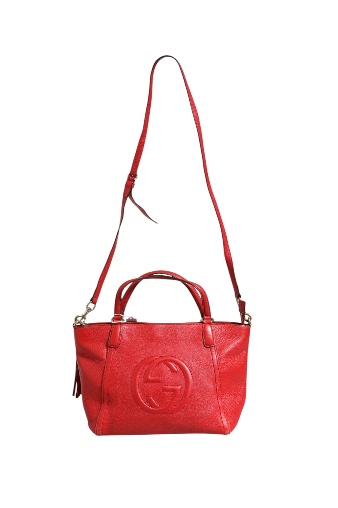 Sac Gucci Soho en cuir petit, sac à main élégant avec bandoulière, en cuir noir, avec logo Gucci visible.