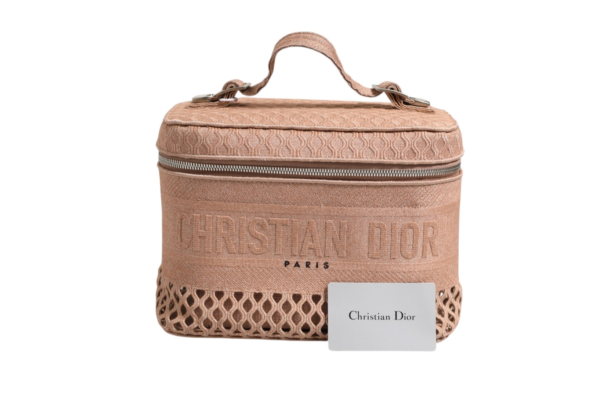 Trousse de voyage Christian Dior en mesh brodé, élégante et compacte, idéale pour ranger maquillage et accessoires.