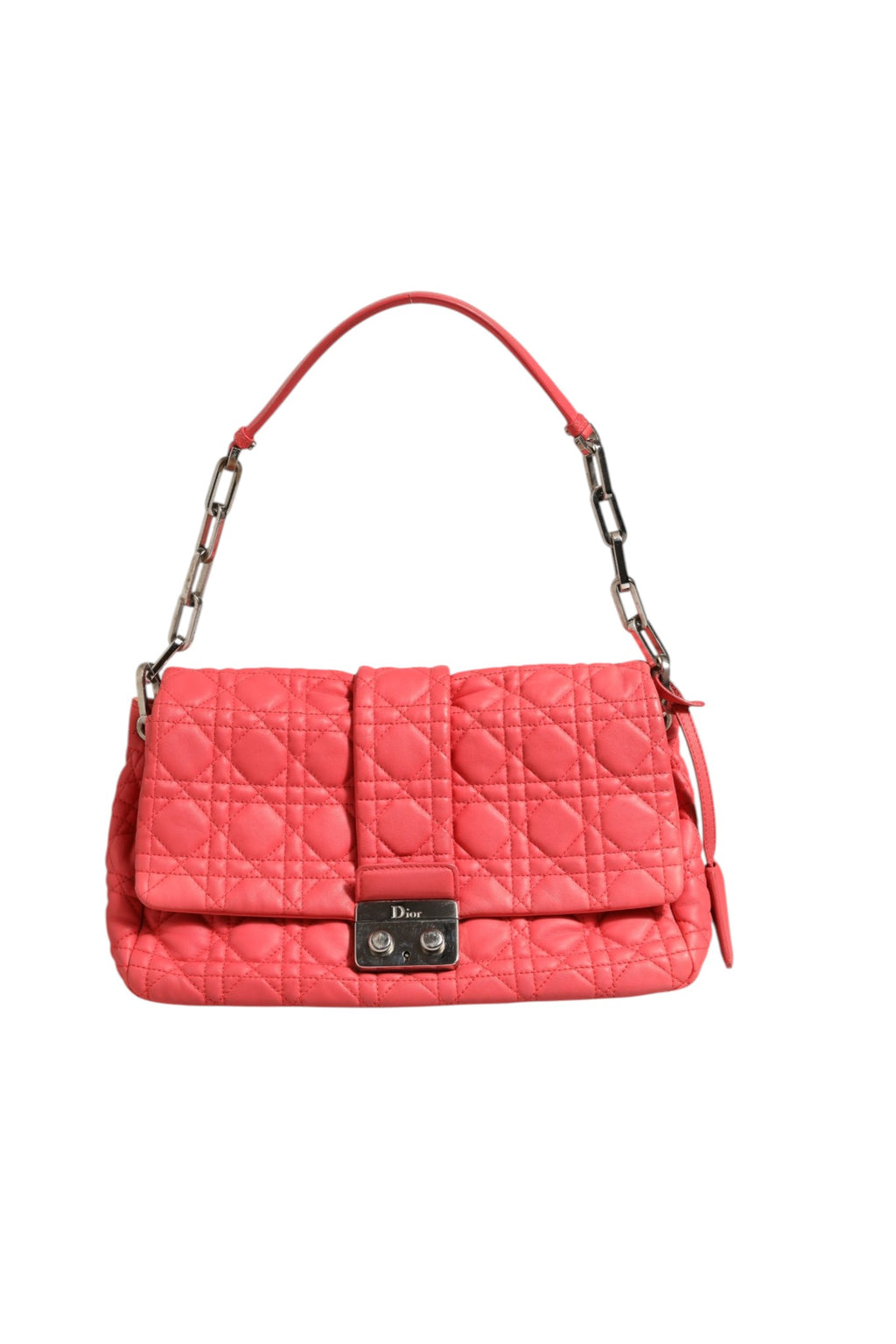 Sac à main Christian Dior Miss Dior en cuir avec motif cannage, élégant et sophistiqué, en couleur neutre.