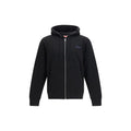 Sweatshirt noire en coton de la marque Kenzo, avec logo visible, portée décontractée, vue frontale.