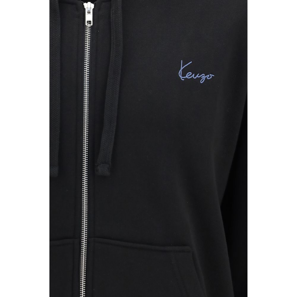 Sweat-shirt en coton noir de la marque Kenzo, coupe décontractée, avec logo emblématique visible sur la poitrine.