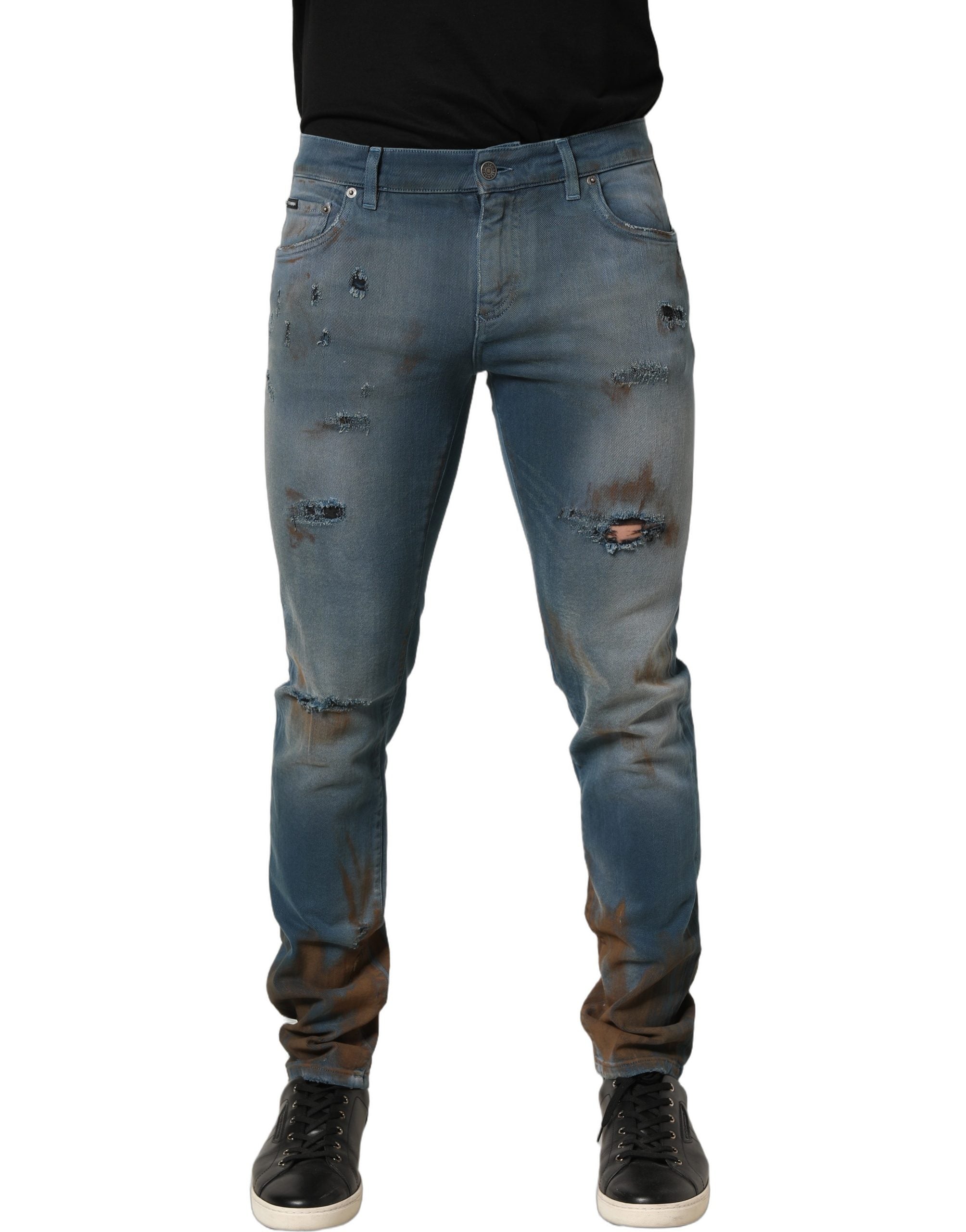 Jeans skinny en denim bleu délavé à la taille moyenne de Dolce & Gabbana, style décontracté et tendance.