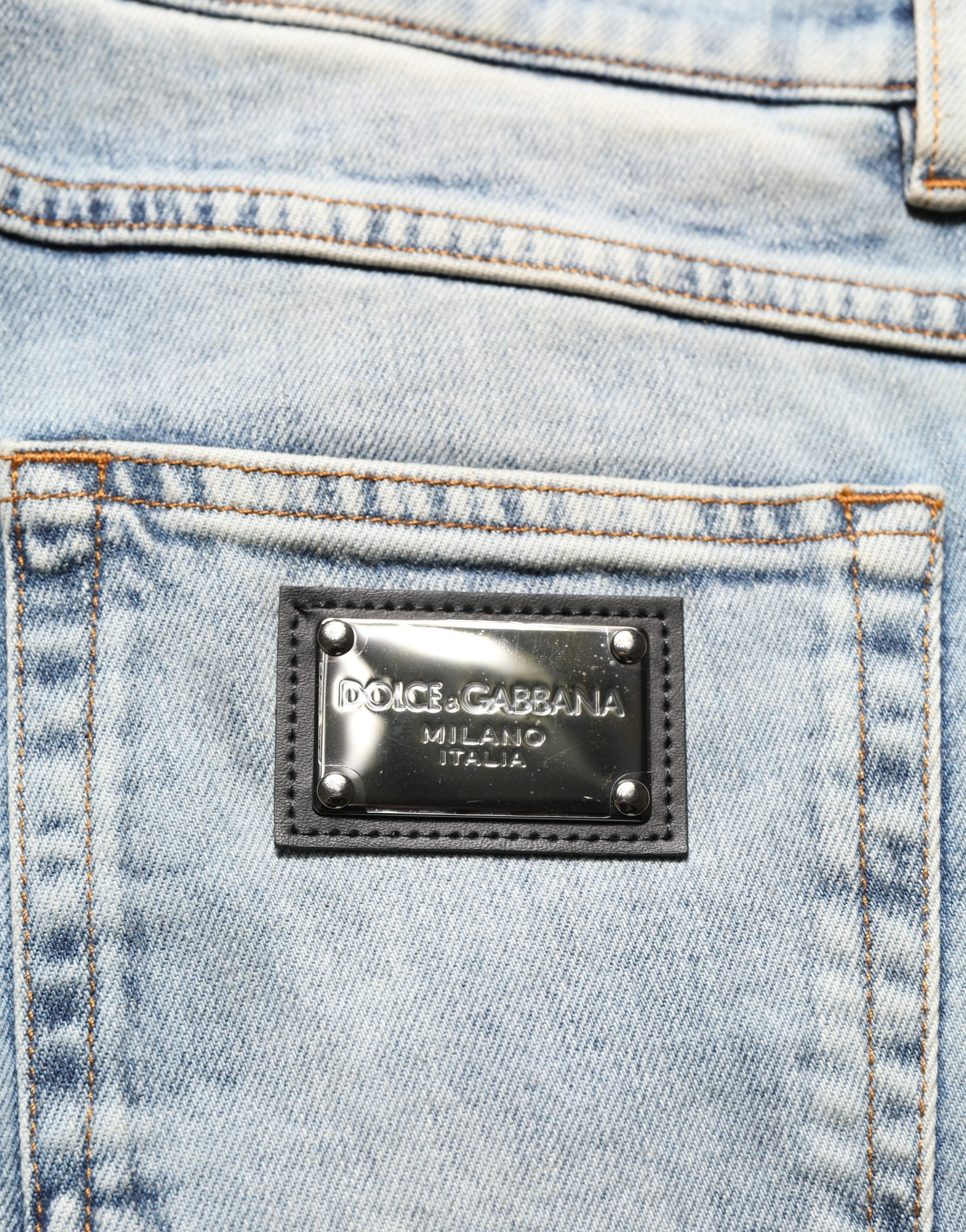 Jeans homme Dolce & Gabbana bleu délavé à taille moyenne et coupe droite, en denim, visible sur l'image.