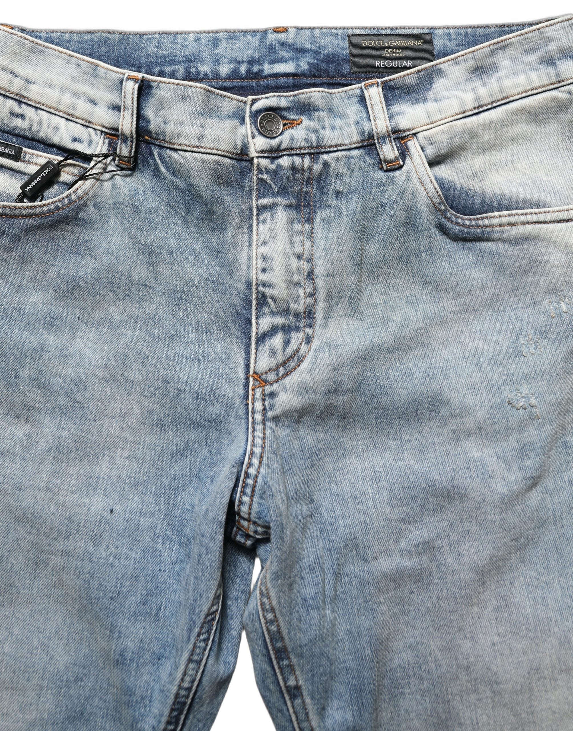 Jeans homme Dolce & Gabbana en denim bleu délavé, taille mi-haute, coupe droite, style décontracté.