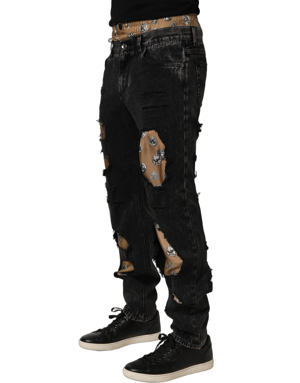 Jean droit en denim noir délavé de Dolce & Gabbana, coton distressed, coupe élégante et moderne.