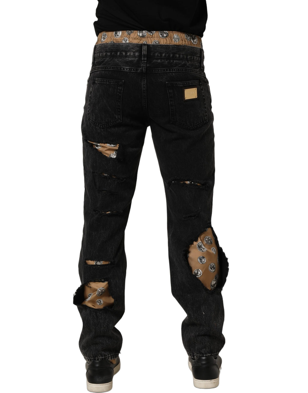 Jeans droits en denim noir déchiré de Dolce & Gabbana, coton usé avec style, visible avec détails décontractés.