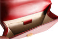 Sac à bandoulière Gucci Marmont en cuir rouge Rosso Ancora, petit modèle avec logo emblématique et finition élégante.