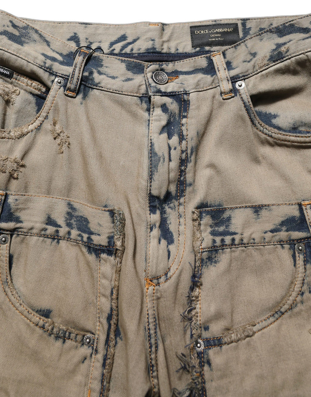 Jeans décontractés beige décolorés pour homme de Dolce & Gabbana, denim déstructuré avec style moderne et détails uniques.