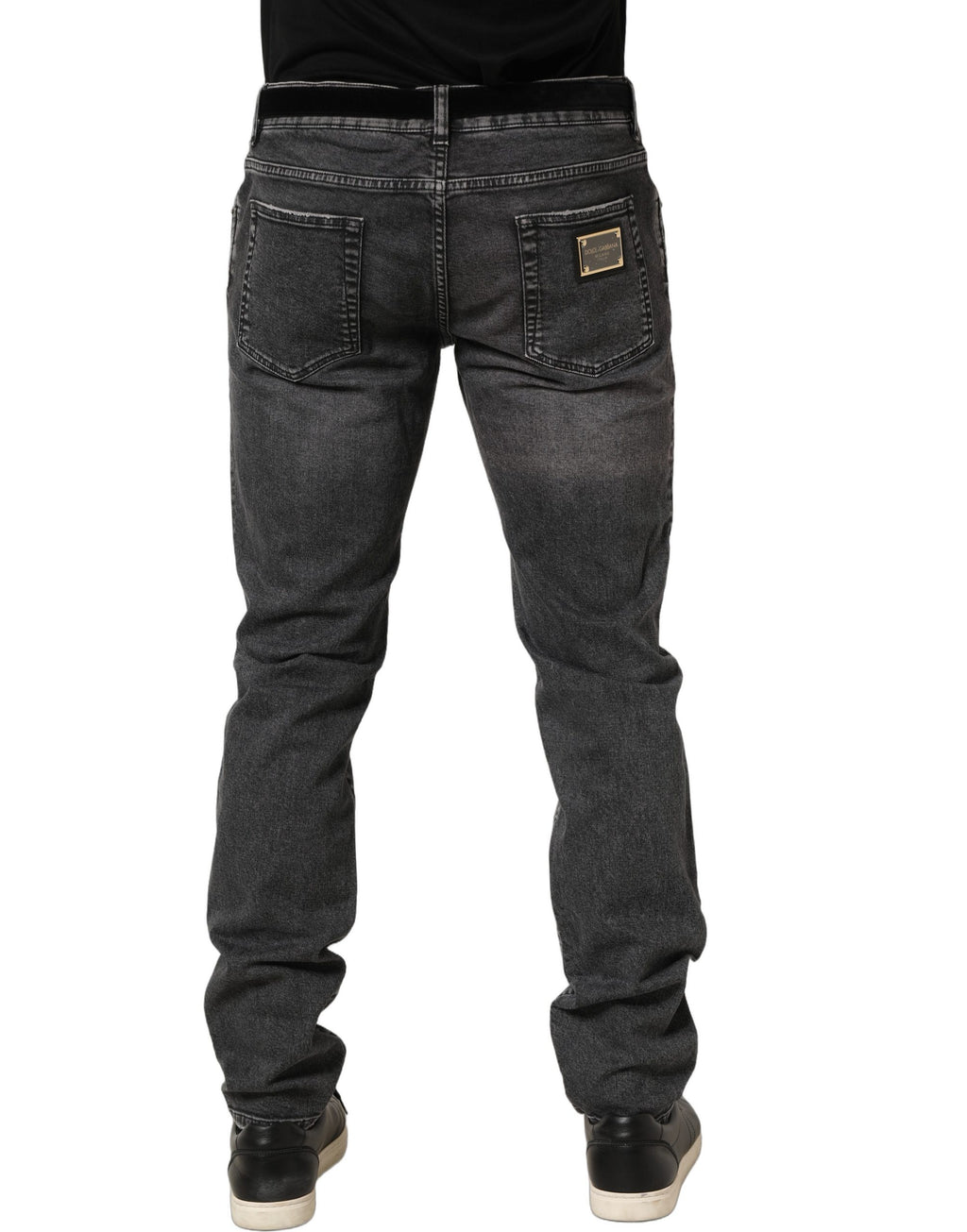 Jeans en denim gris foncé déchiré à taille moyenne de Dolce & Gabbana, mode décontractée et élégante, vue de face.