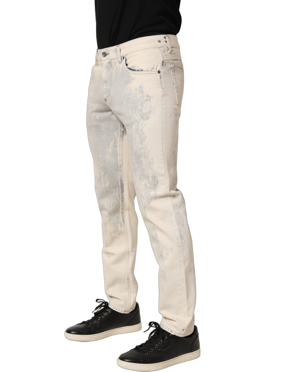 Jeans homme en coton tie-dye beige de Dolce & Gabbana, coupe droite, style denim, visible avec détails de couture.