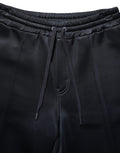 Pantalon de jogging pour homme Dolce & Gabbana en polyester noir, style décontracté et confortable, avec ceinture élastique.
