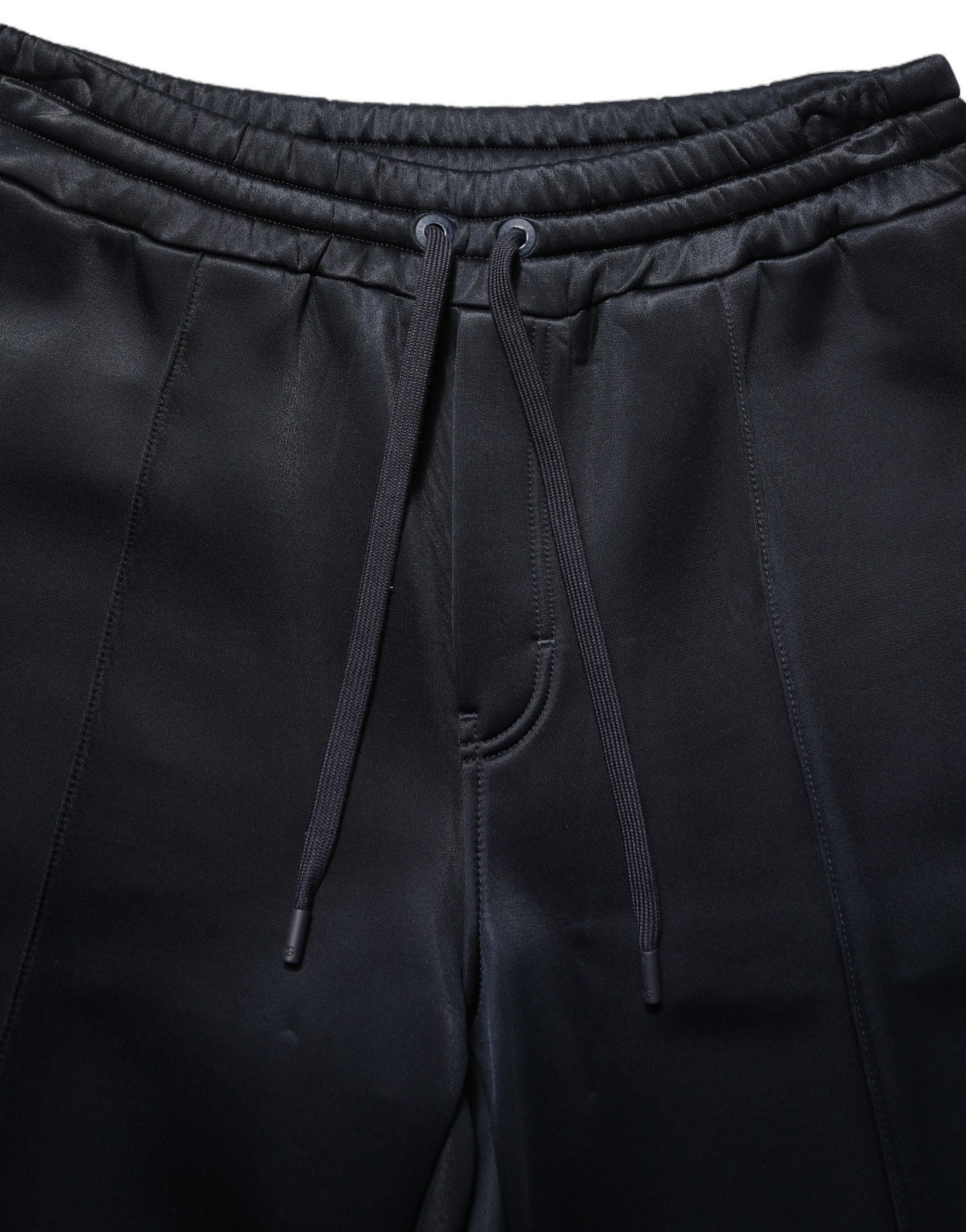 Pantalon de jogging pour homme Dolce & Gabbana en polyester noir, style décontracté et confortable, avec ceinture élastique.