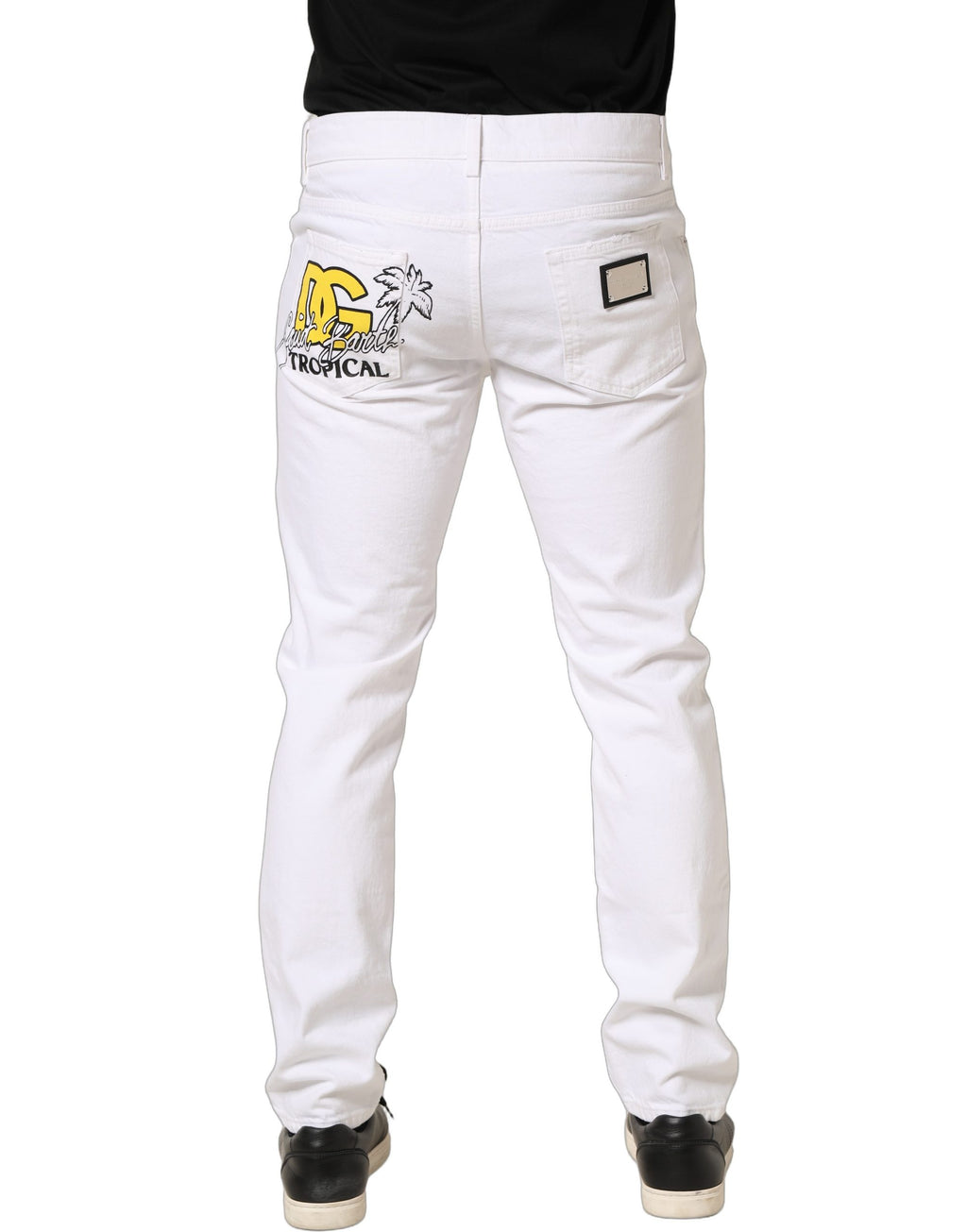 Jeans homme slim fit en denim blanc déchiré de Dolce & Gabbana, coton léger et style moderne.