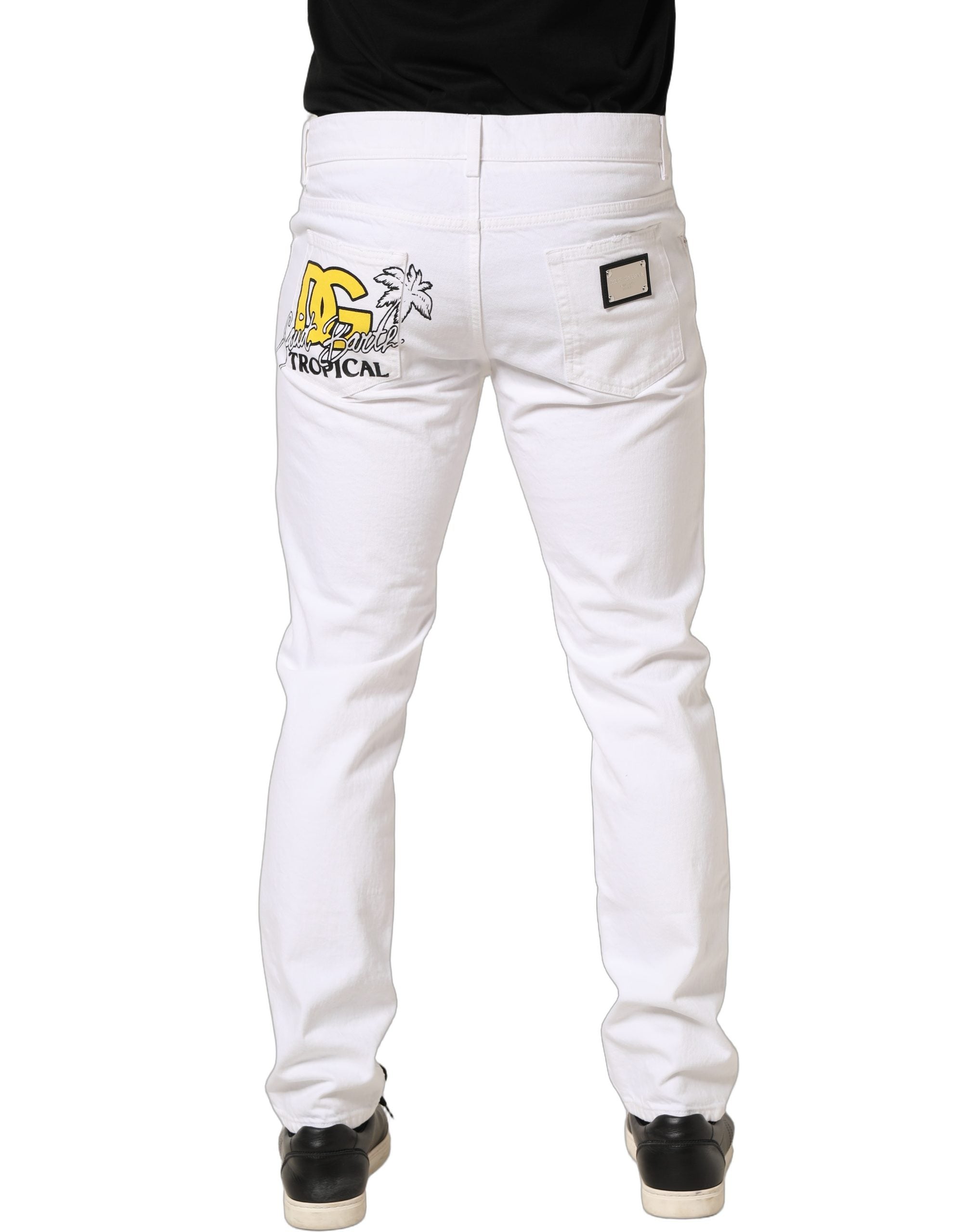 Jeans homme slim fit en denim blanc déchiré de Dolce & Gabbana, coton léger et style moderne.