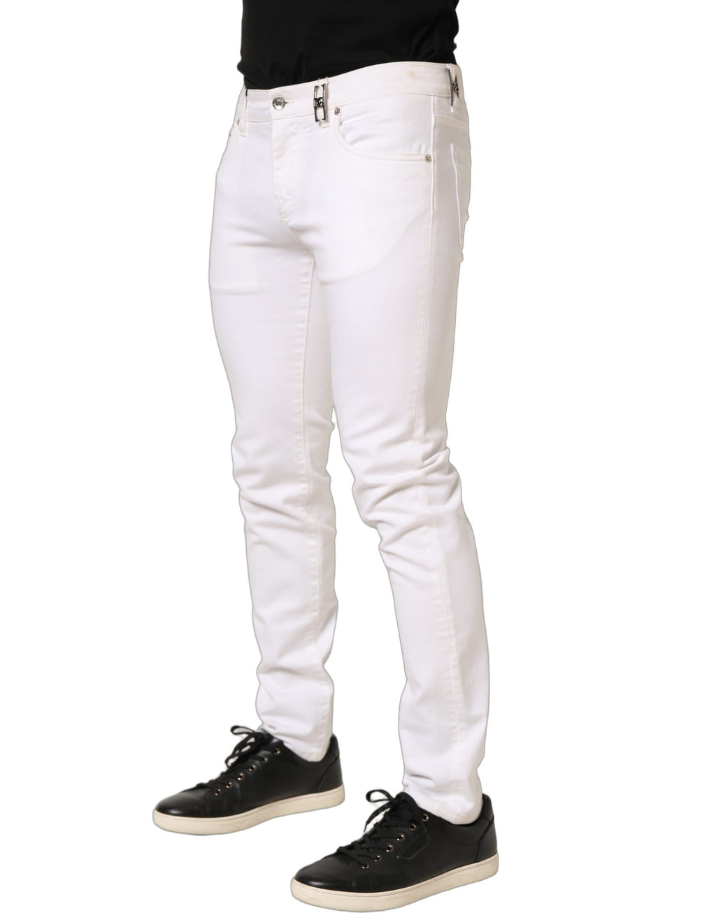 Jeans skinny en coton blanc de Dolce & Gabbana, taille mi-haute et ajustés, visibles avec détails de couture et boutons.