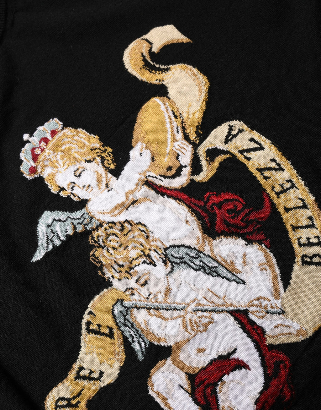 Pull-over en laine noir Dolce & Gabbana avec motif d'anges, col ras du cou, style élégant et contemporain.