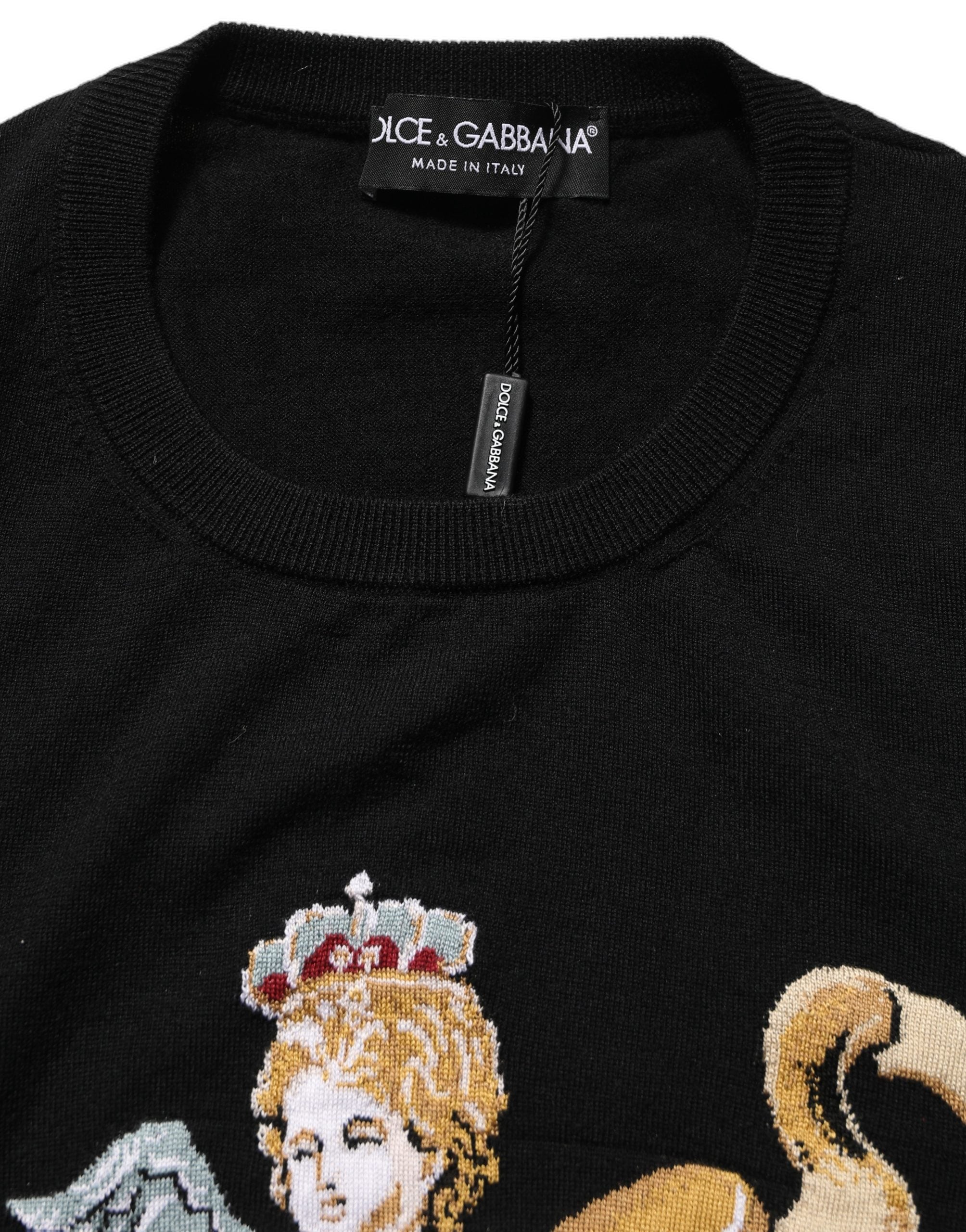 Pull-over en laine noir Dolce & Gabbana Angels avec col ras du cou, confortable et élégant, vue de face.