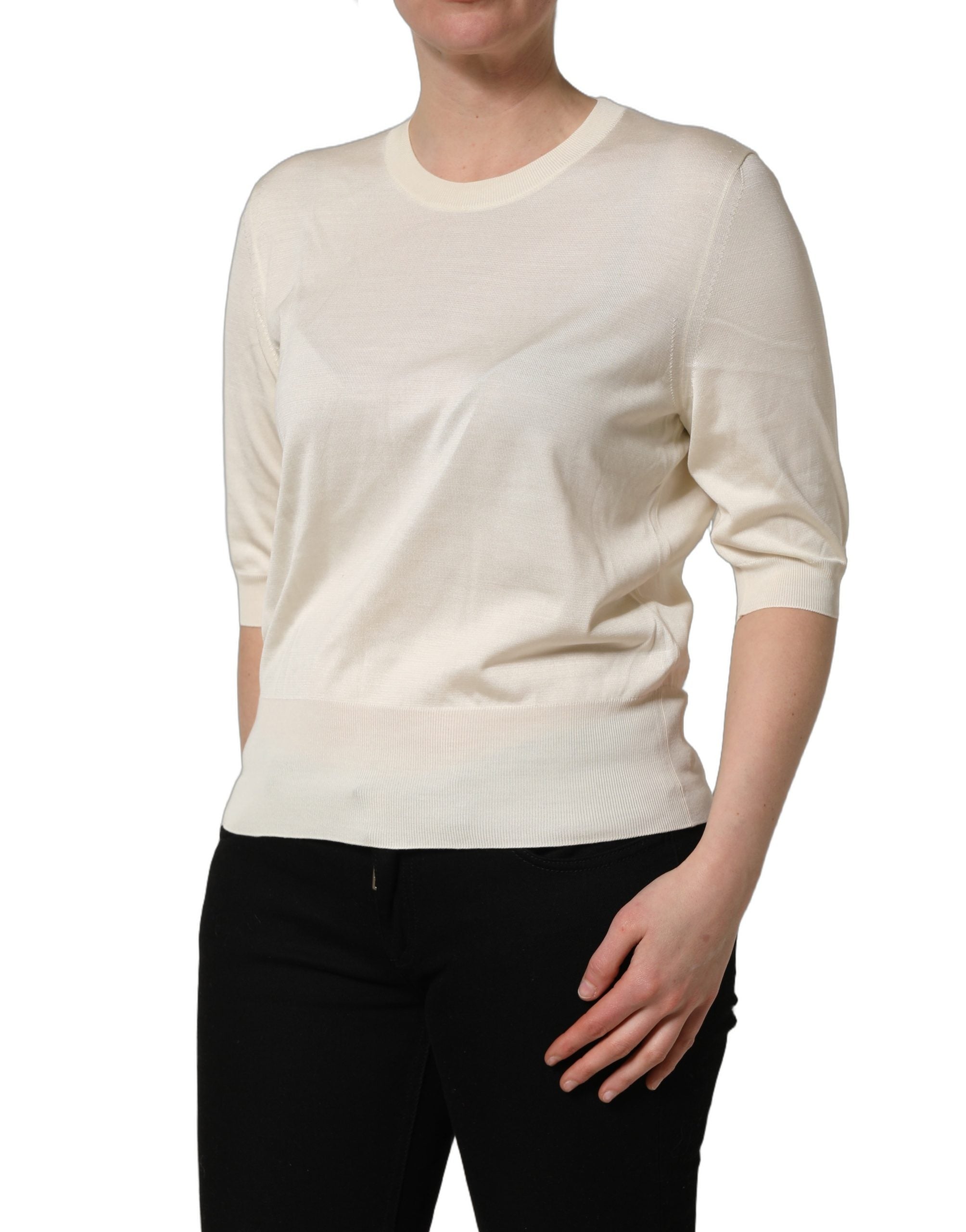 Pull à manches 3/4 Dolce & Gabbana blanc cassé, col rond, doux et confortable, style décontracté et élégant.