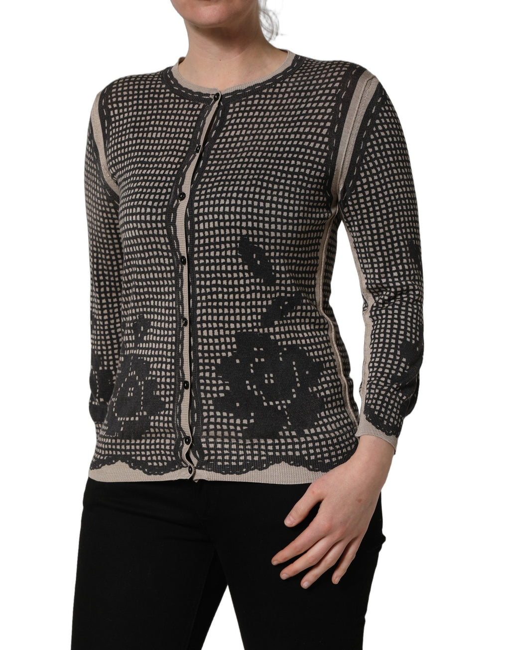 Cardigan Dolce & Gabbana noir avec motifs floraux en dentelle et boutons, version élégante et raffinée.