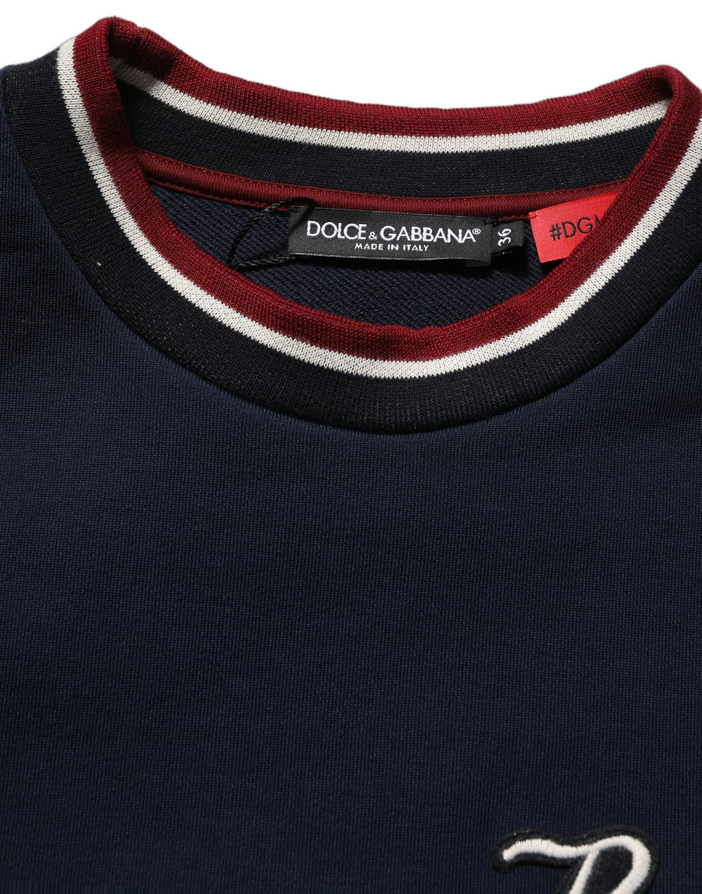 Sweat-shirt Dolce & Gabbana à panneaux bleus et rouges avec écusson "Royals", en coton confortable.