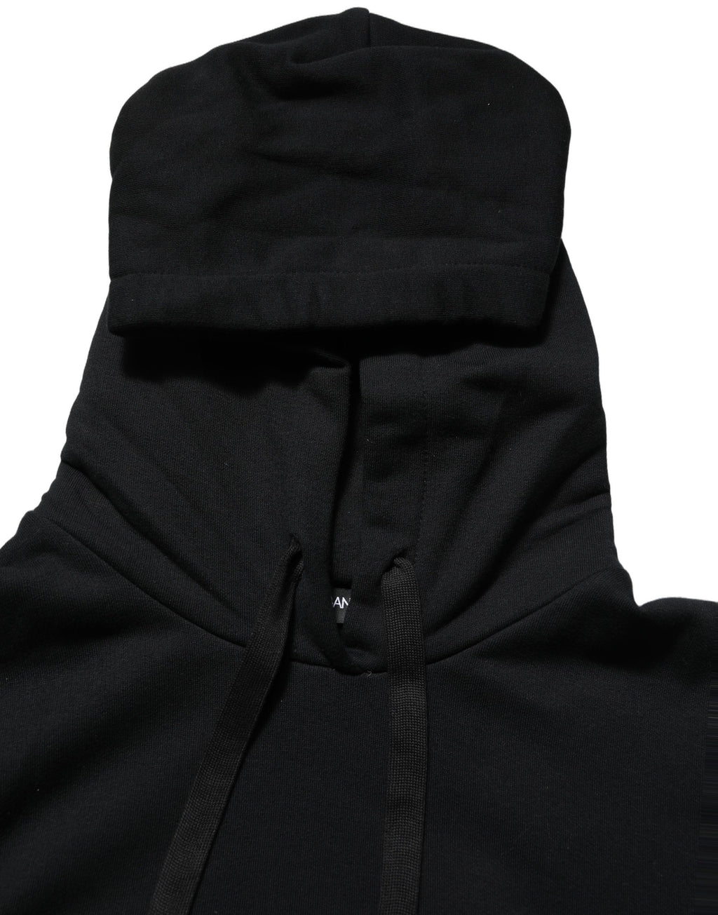 Sweat à capuche Dolce & Gabbana noir et blanc avec appliqué, style décontracté et détails élégants, portée sur un mannequin.