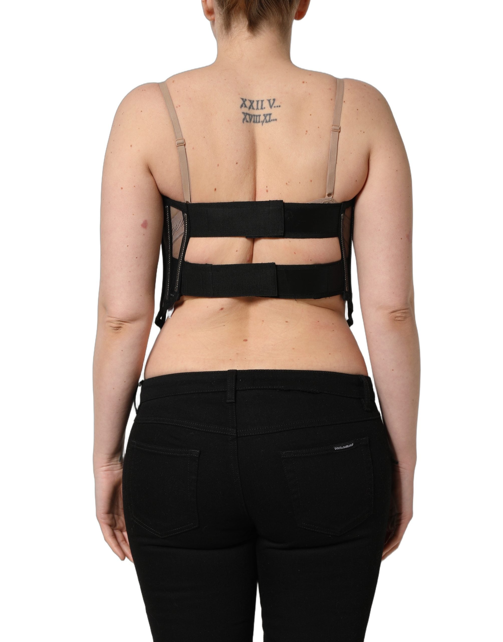 Corset cropé en tulle noir de Dolce & Gabbana, bodysuit sexy avec détails transparents et finition élégante.