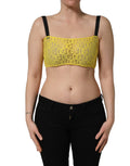 Top en faux cuir Dolce & Gabbana à imprimé léopard jaune et noir, style bustier élégant et tendance.