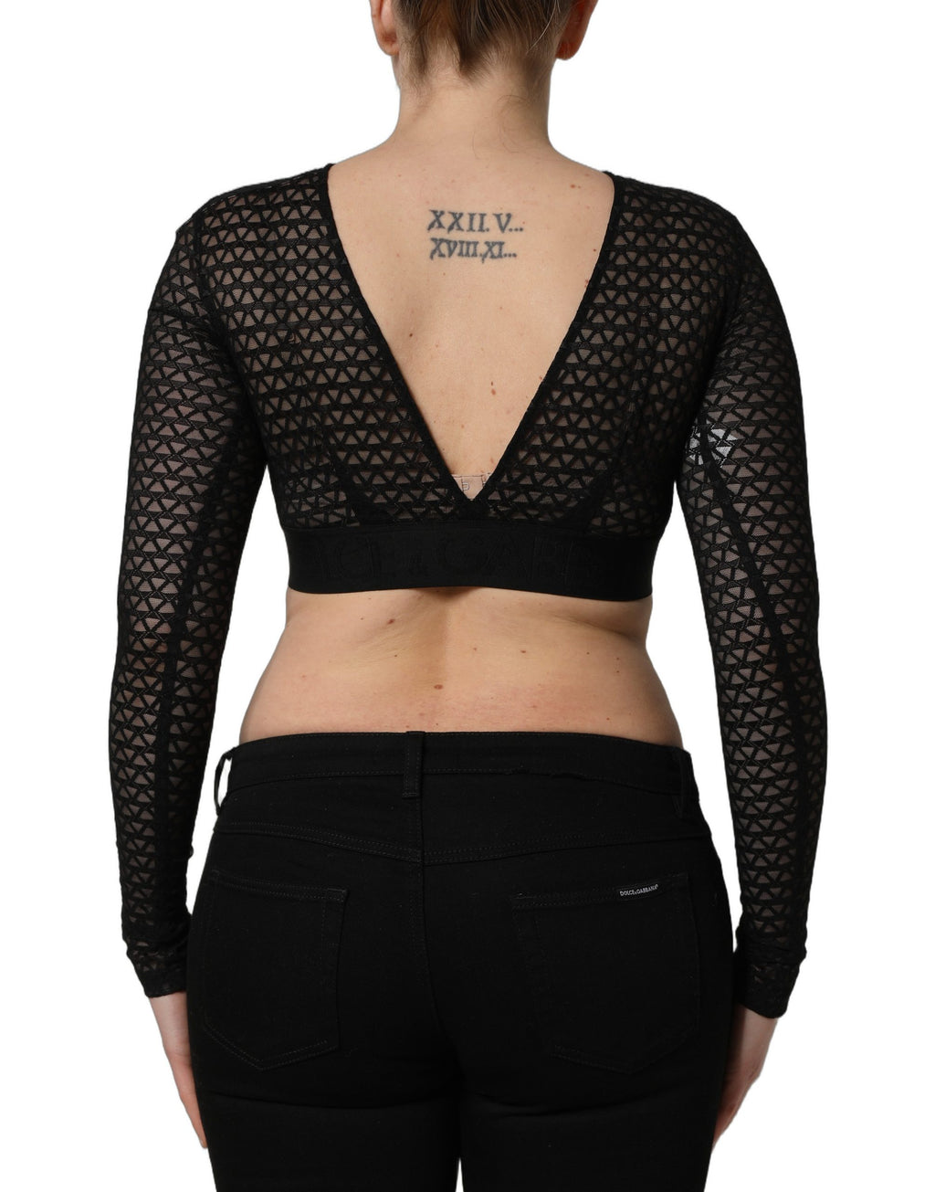 Top court en nylon noir Dolce & Gabbana à manches longues et en filet, coupe courte et style tendance.