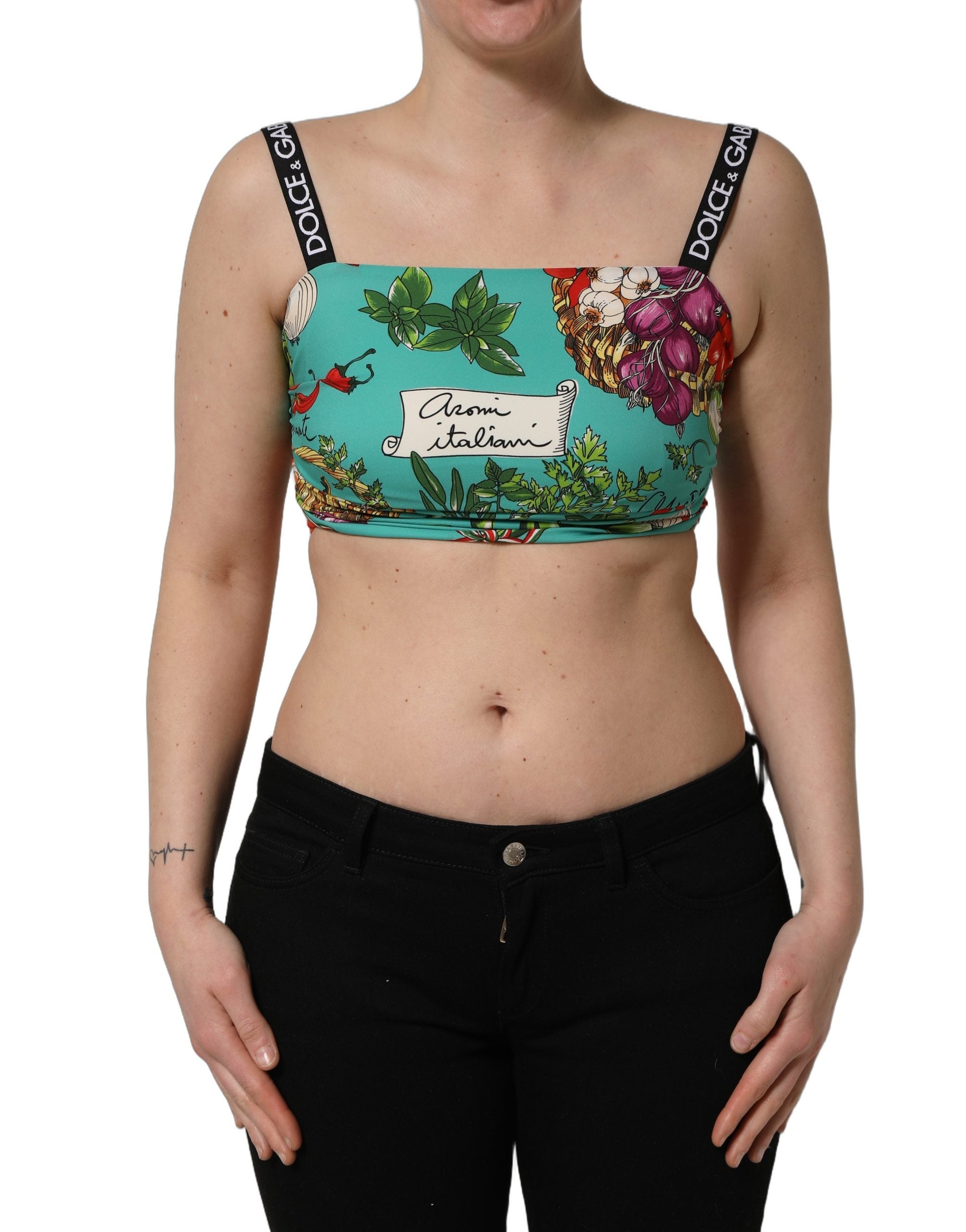Top court en soie turquoise avec imprimé végétal Dolce & Gabbana, coupe crop, détails colorés et design élégant.