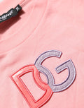 T-shirt en coton rose Dolce & Gabbana avec logo DG rond, col rond, vue de face.