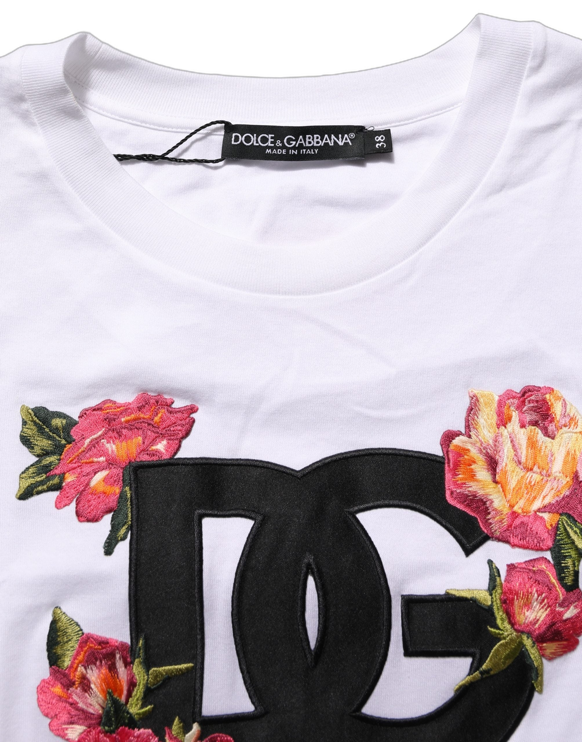 T-shirt court en coton blanc Dolce & Gabbana avec motif floral DG, jersey léger, visible avec col rond et manches courtes.