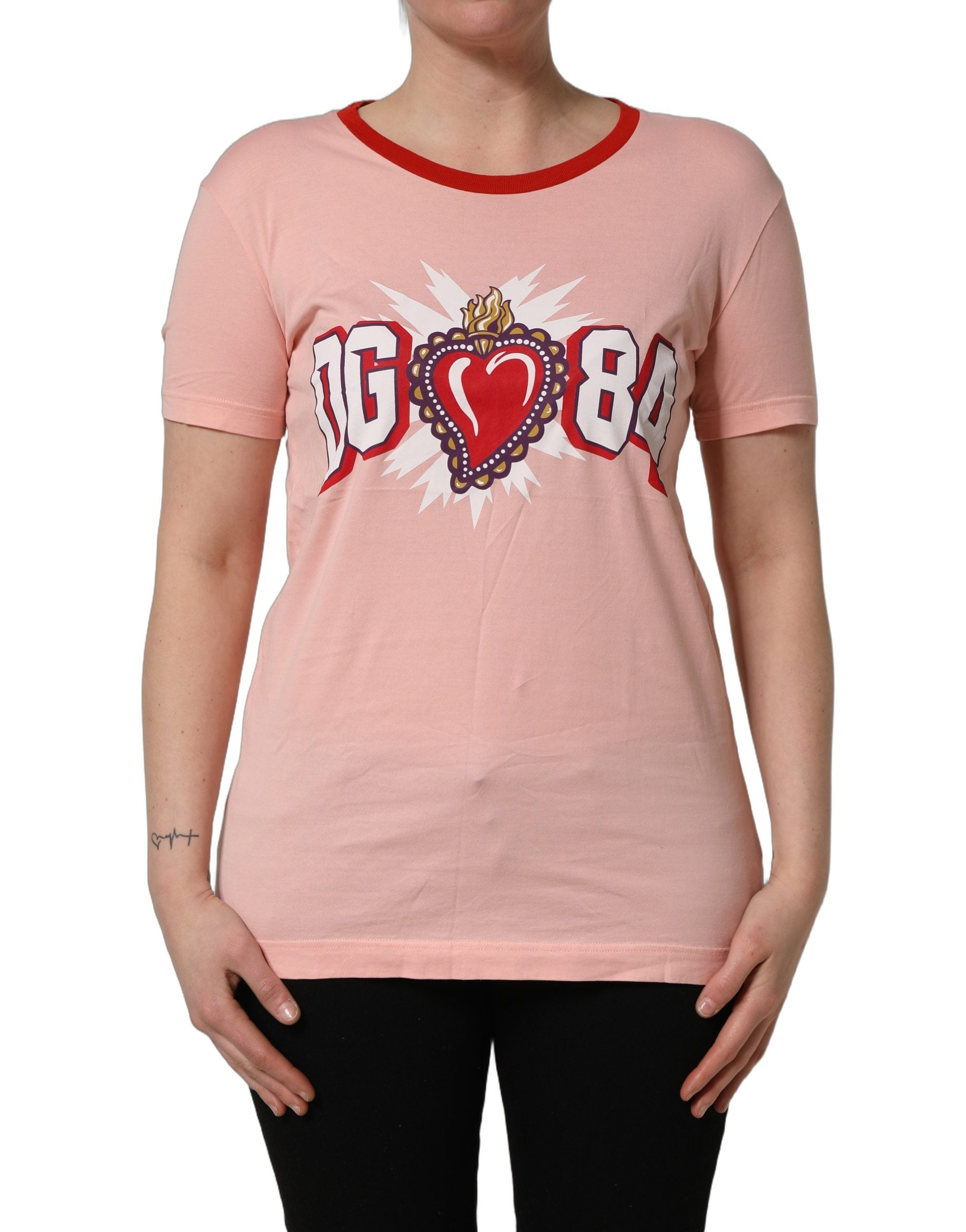 T-shirt en coton rose à graphique Dolce & Gabbana avec col rond, motif coloré visible sur le devant.