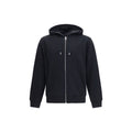Sweat-shirt noir en coton Givenchy avec logo discret, porté par un mannequin, vue de face.