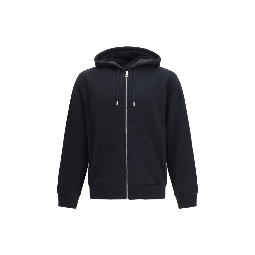 Sweat-shirt noir en coton Givenchy avec logo discret, porté par un mannequin, vue de face.