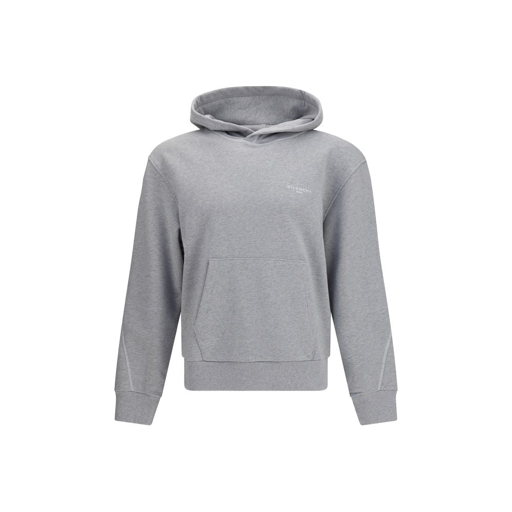 Sweat-shirt gris en coton de la marque Givenchy, vue de face avec logo discret sur la poitrine.