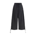 Pantalon décontracté en polyester noir de la marque Kenzo, coupe confortable et style moderne pour homme.
