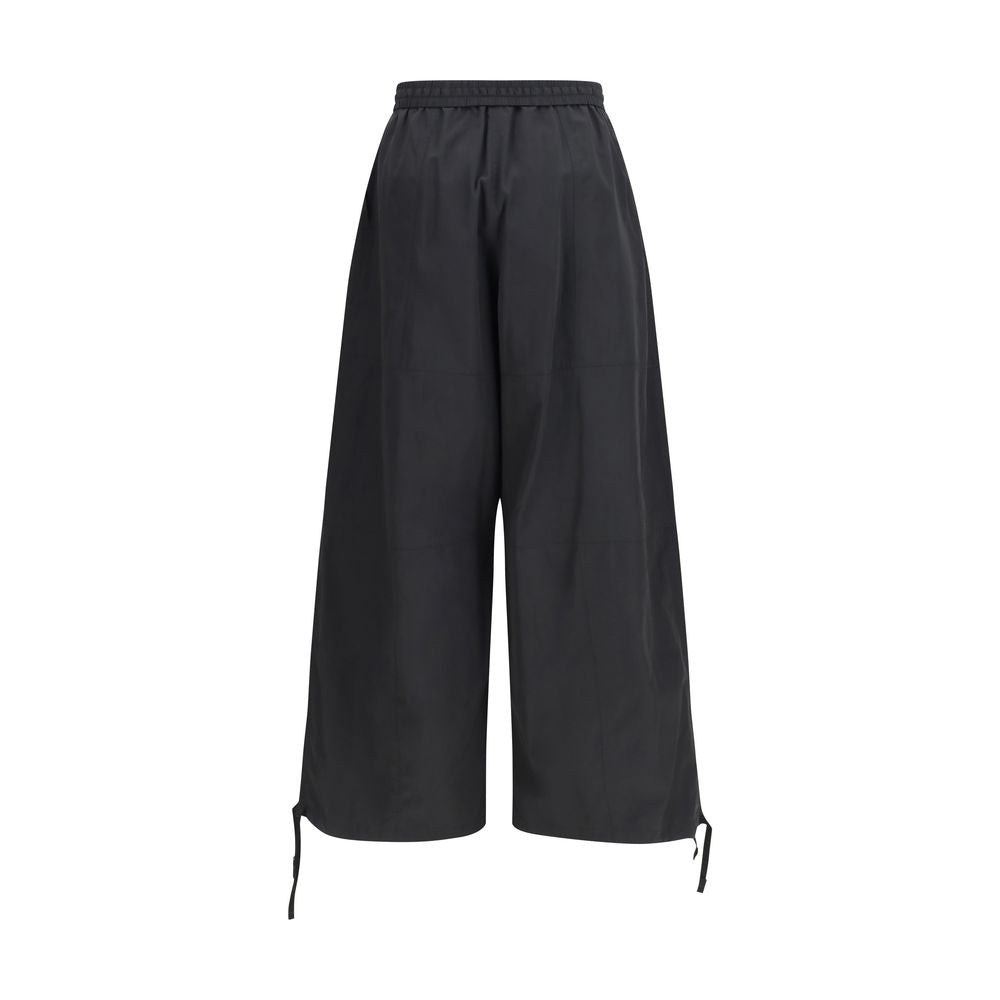 Pantalon décontracté en polyester noir de la marque Kenzo, coupe confortable et style moderne visible dans l'image.
