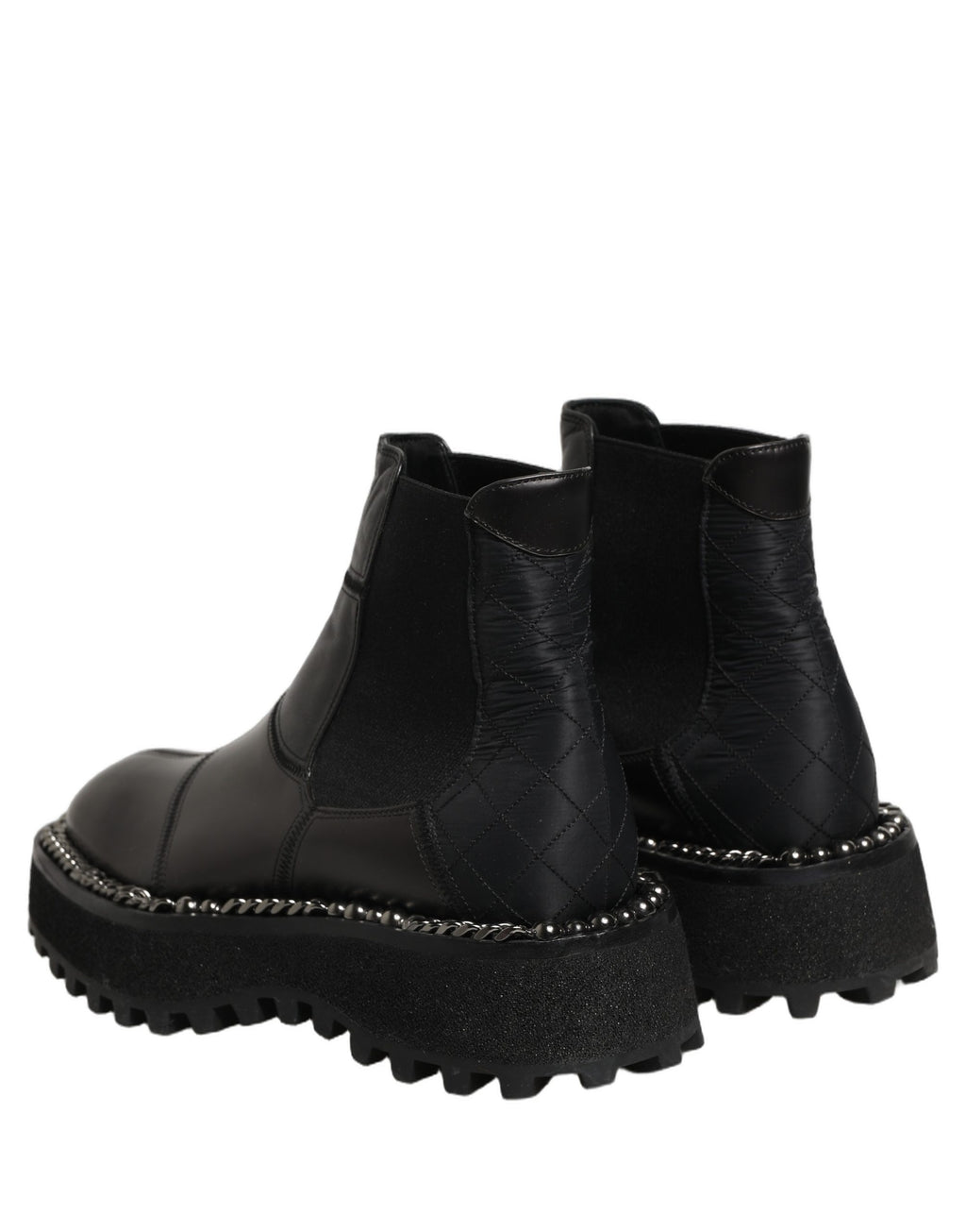 Chaussures Chelsea en cuir noir Dolce & Gabbana pour hommes, sans lacets, avec semelle en caoutchouc et design élégant.