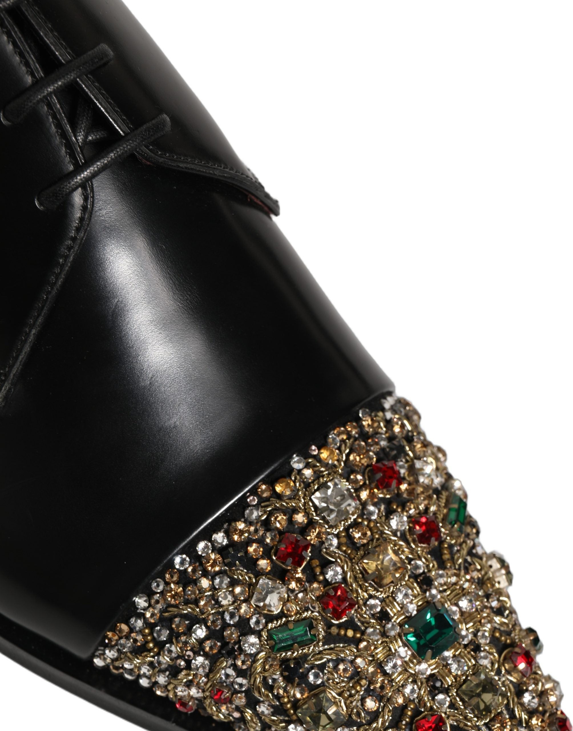 Chaussures Derby noires Dolce & Gabbana avec ornements élégants pour occasion formelle, en cuir lisse et détails sophistiqués.