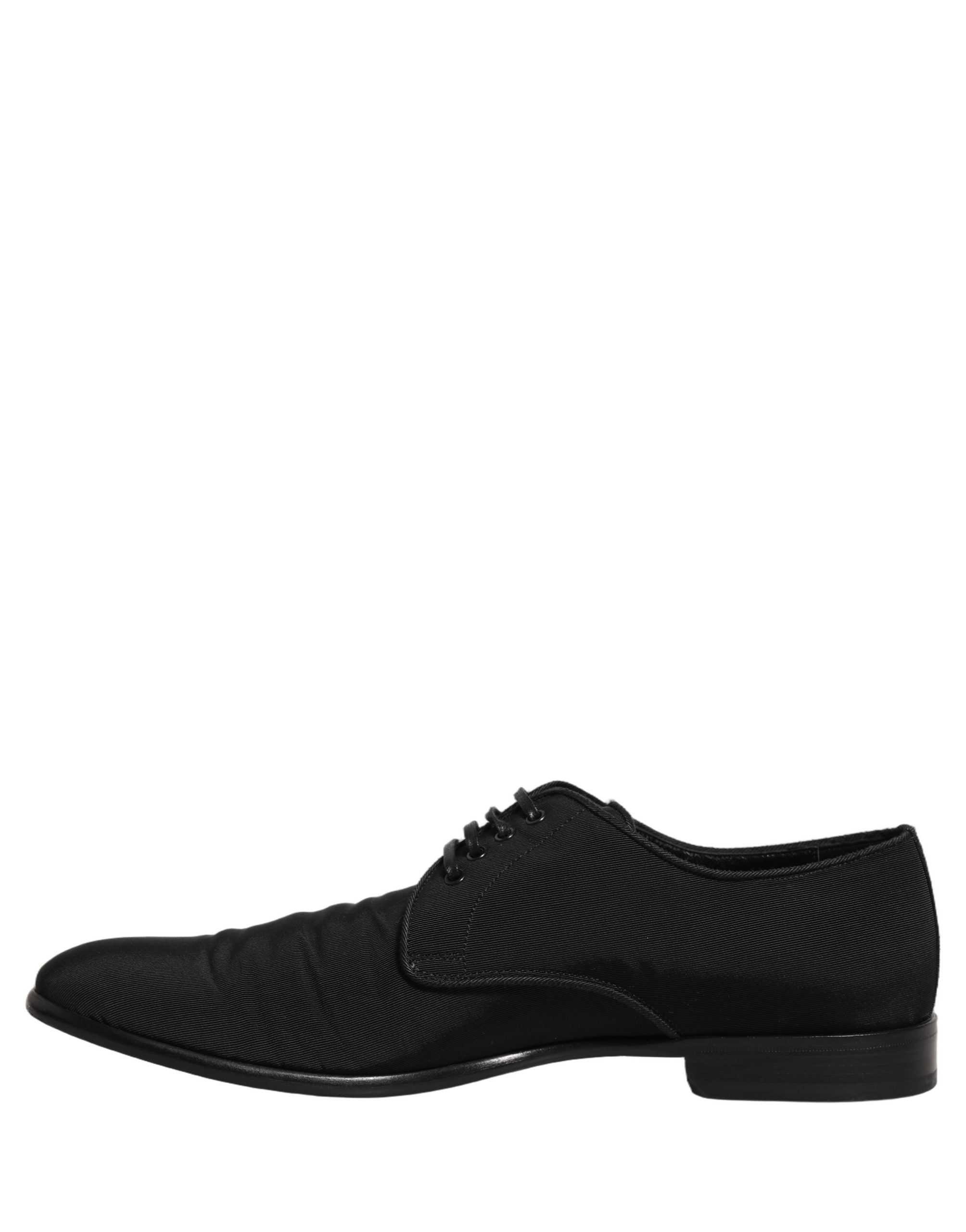 Chaussures derby formelles en daim noir Dolce & Gabbana avec laçage, élégantes et sophistiquées.