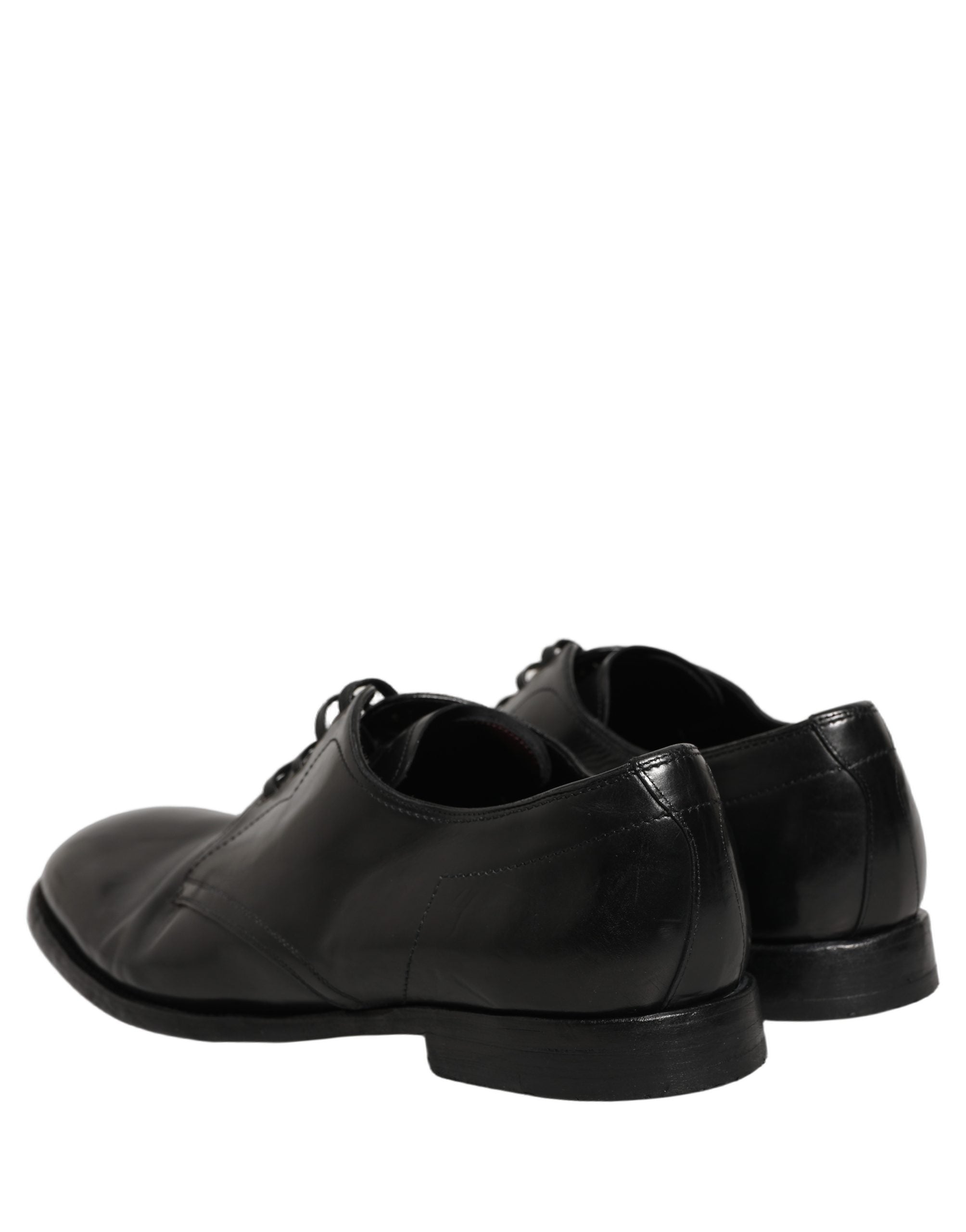 Chaussures derby habillées en cuir noir Dolce & Gabbana avec laçage, élégantes et sophistiquées pour occasions formelles.