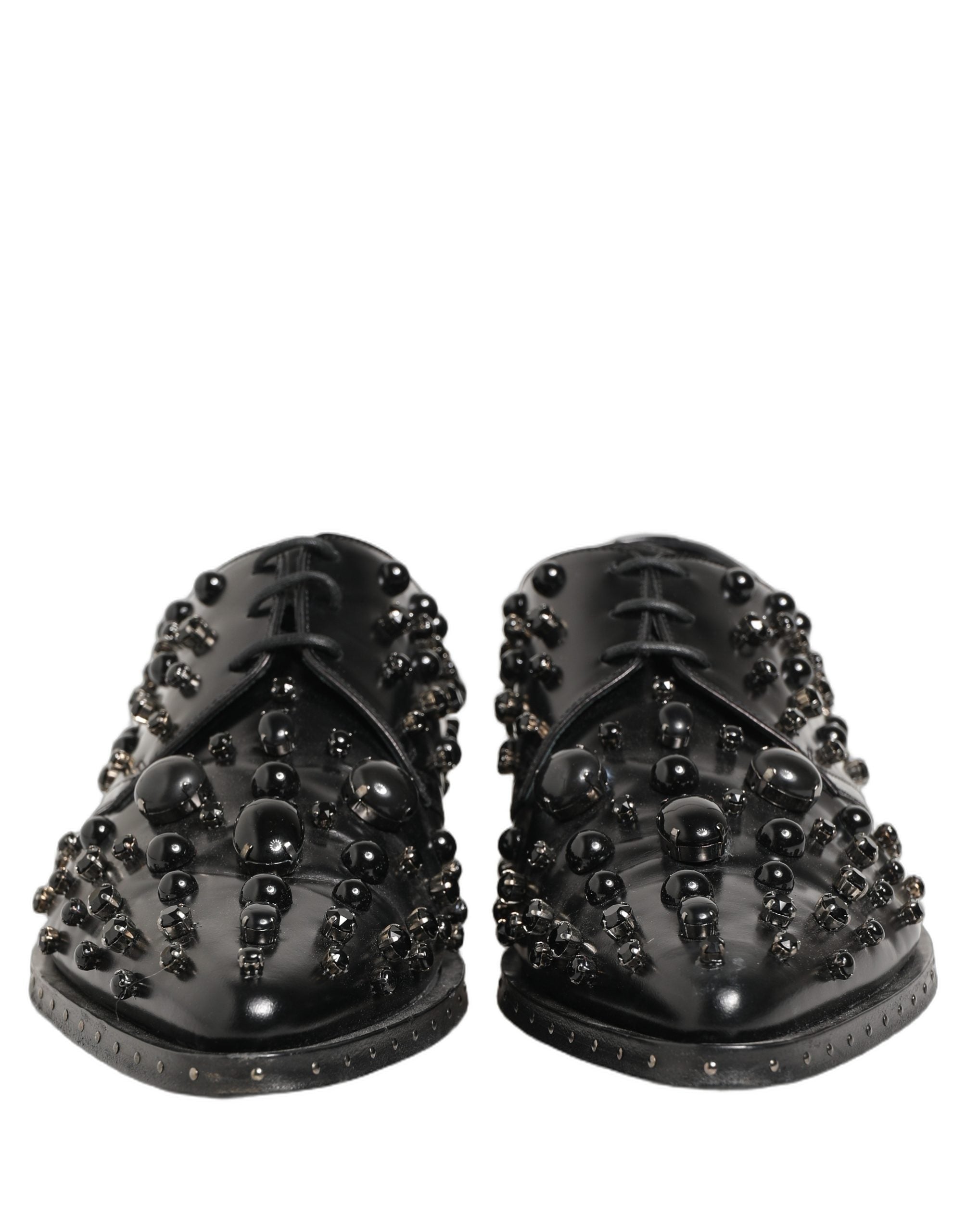 Chaussures Derby formelles en cuir noir Dolce & Gabbana pour homme, ornées de studs, élégantes et sophistiquées.