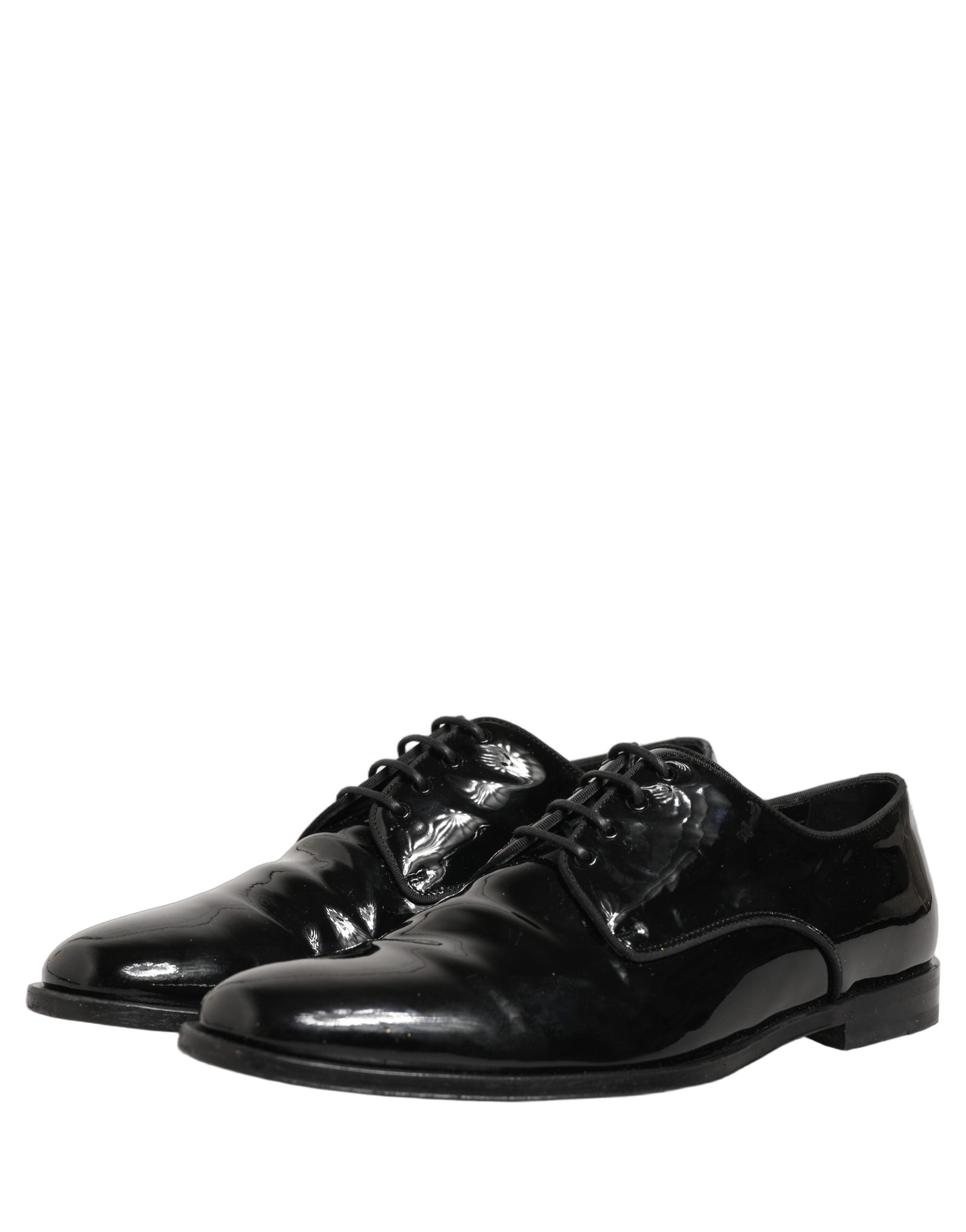Chaussures derby noires en cuir Dolce & Gabbana avec lacets, style formel et sophistiqué.