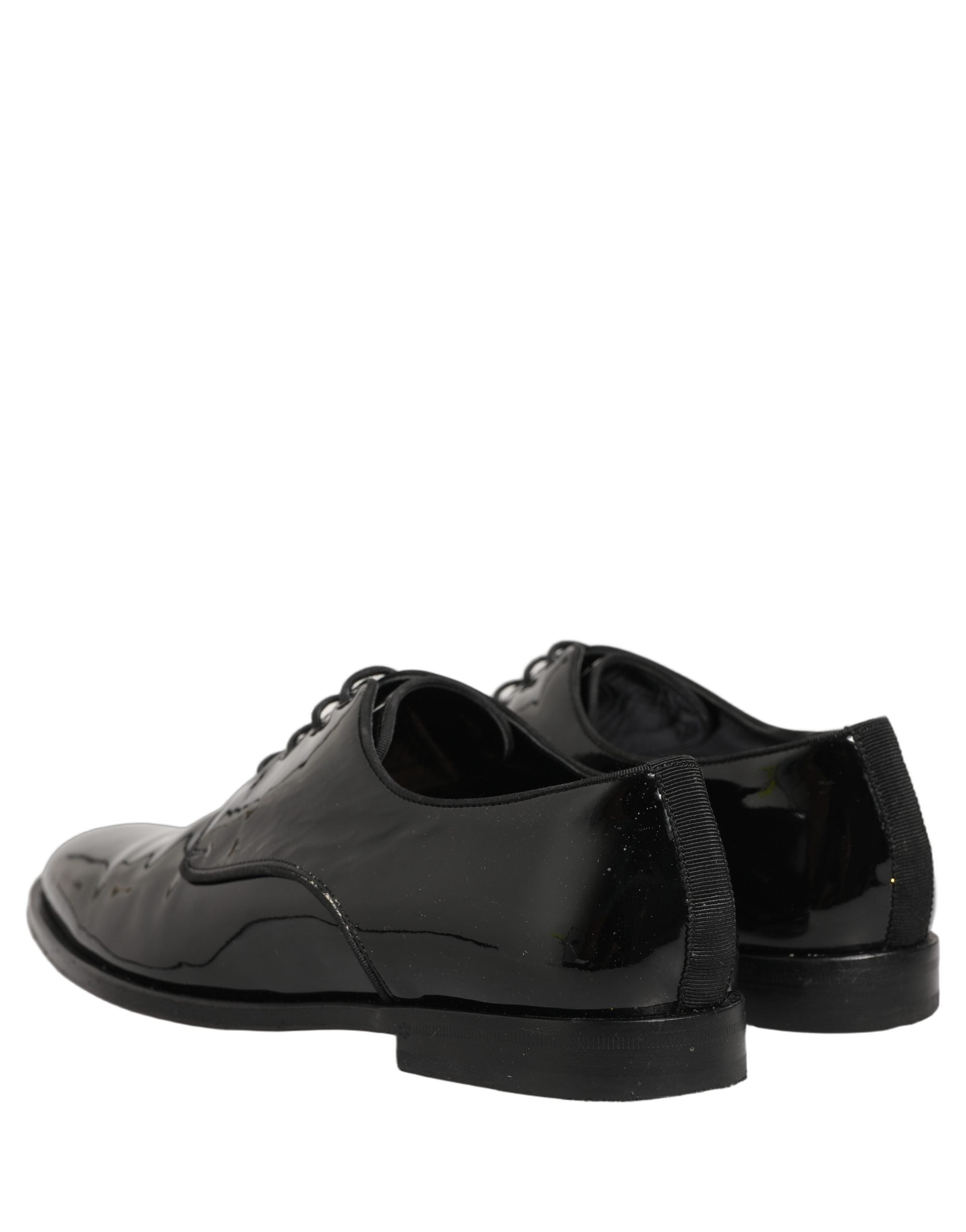 Chaussures Derby formelles en cuir noir Dolce & Gabbana avec lacets, élégantes et sophistiquées.