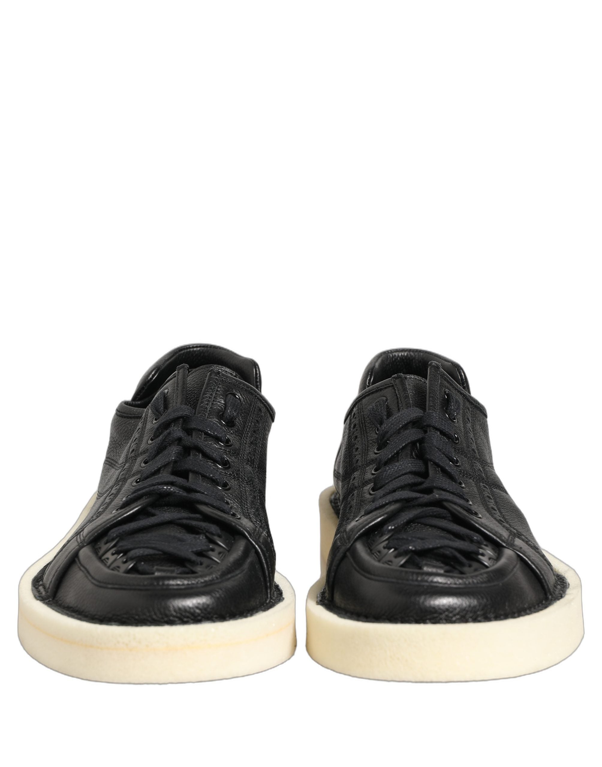 Chaussures basses en cuir noir Dolce & Gabbana, baskets à lacets élégantes pour hommes, vue de face.