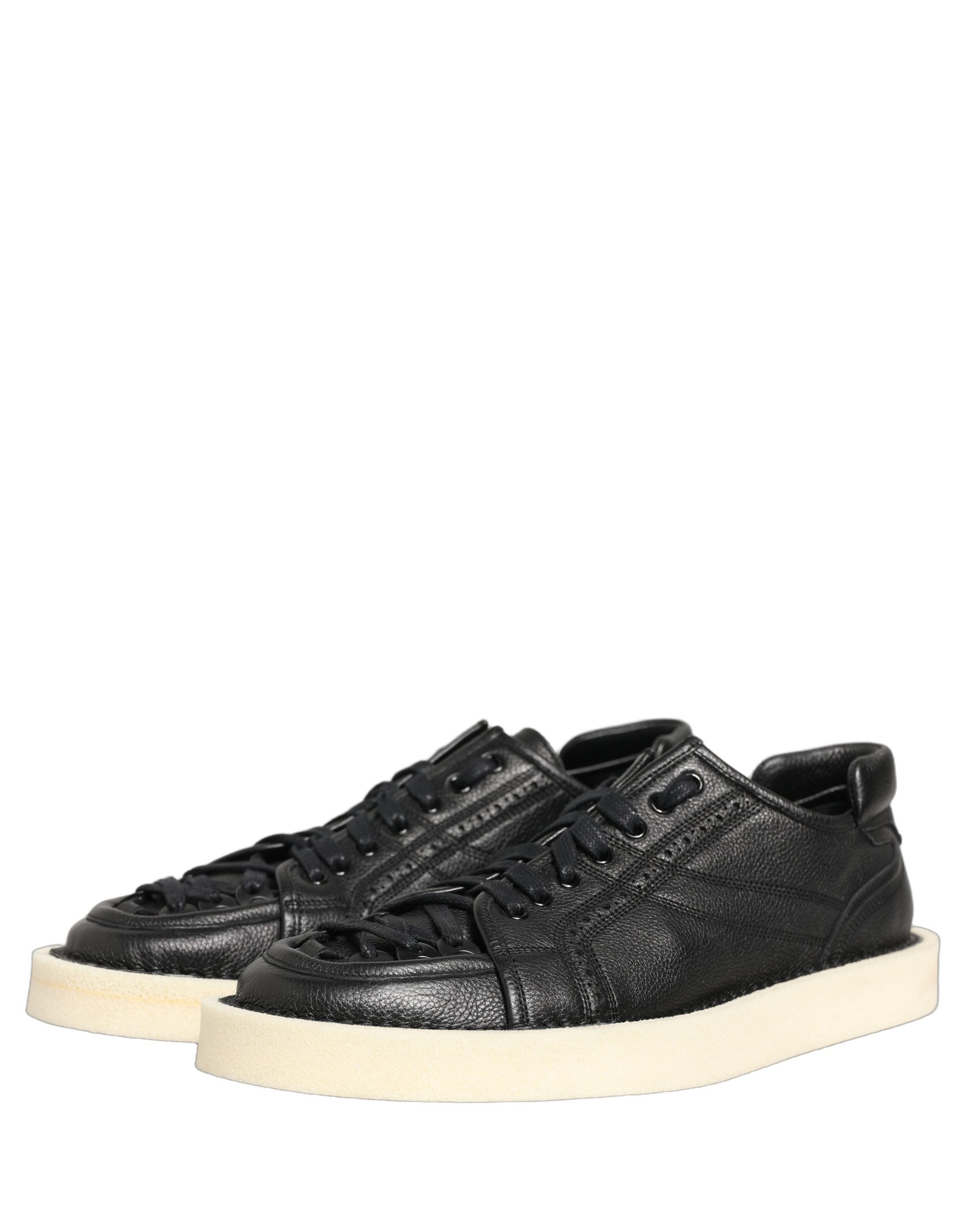 Chaussures sneakers basses en cuir noir de Dolce & Gabbana avec lacets, style moderne et élégant.