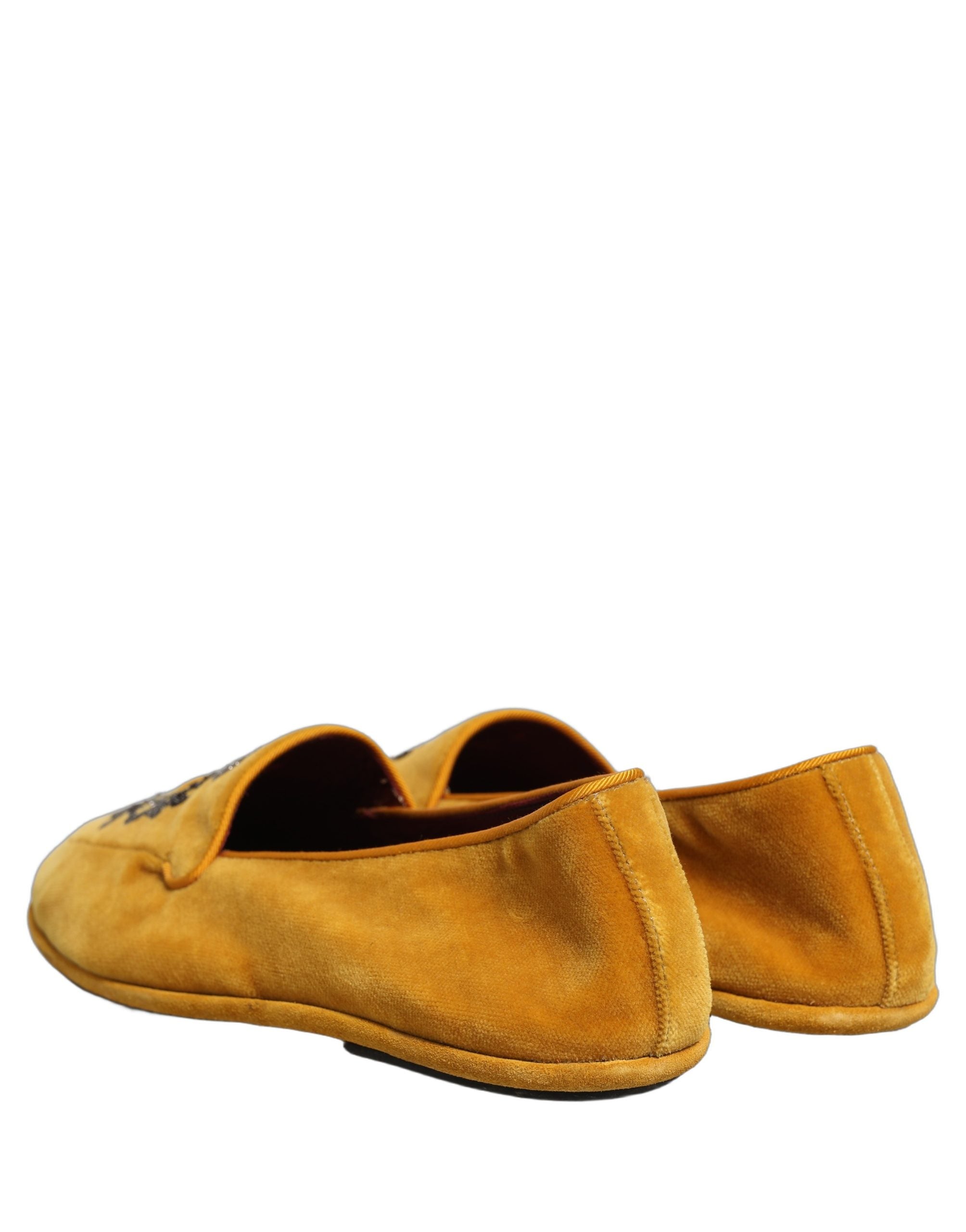 Chaussures mocassins Dolce & Gabbana en velours jaune avec broderie de couronne, élégantes et confortables.