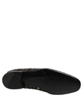 Chaussures mocassins Dolce & Gabbana noires et argentées avec embellissements, slips-on élégants en cuir.